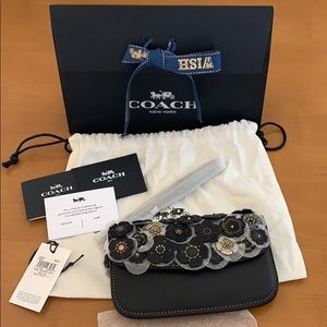 Coach tea rose black clutch